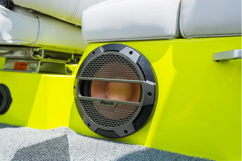 Slide: The Image of 2018 MasterCraft X23 boat with vibrant yellow exterior and premium Klipsch speaker system. - 38