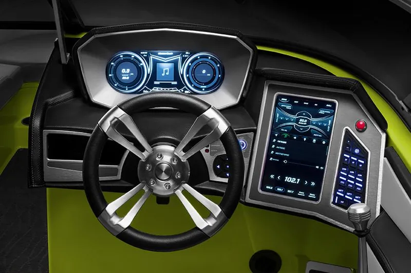 Slide: The Image of Manufacturer Provided Image: 2018 MasterCraft X23 boat dashboard with advanced digital controls and steering wheel. - 39