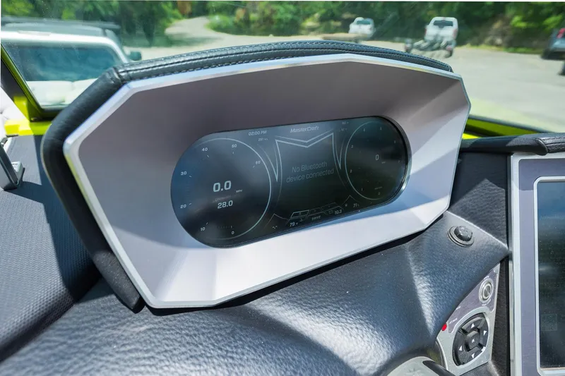 Slide: The Image of Dashboard of a 2018 MasterCraft X23 boat with digital display. - 42