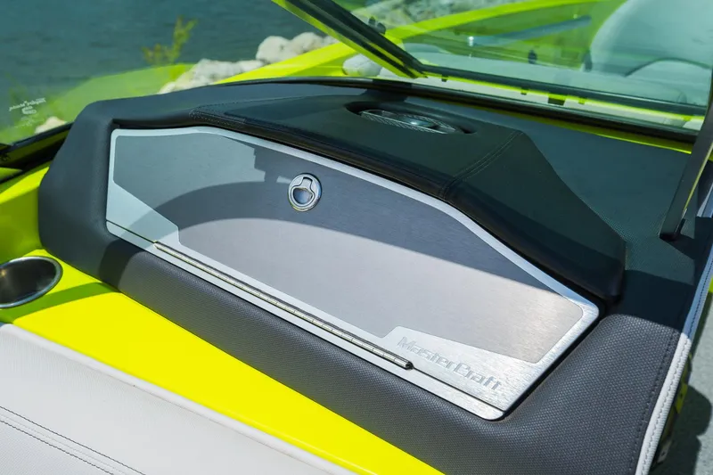 Slide: The Image of 2018 MasterCraft X23 dashboard with sleek design and vibrant yellow accents. - 47