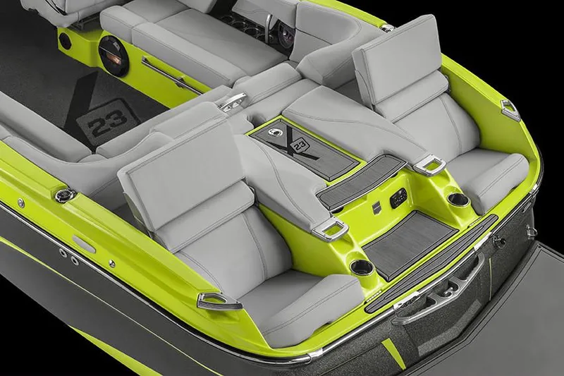Slide: The Image of Manufacturer Provided Image: 2018 MasterCraft X23 boat interior with lime green and gray seating. - 8