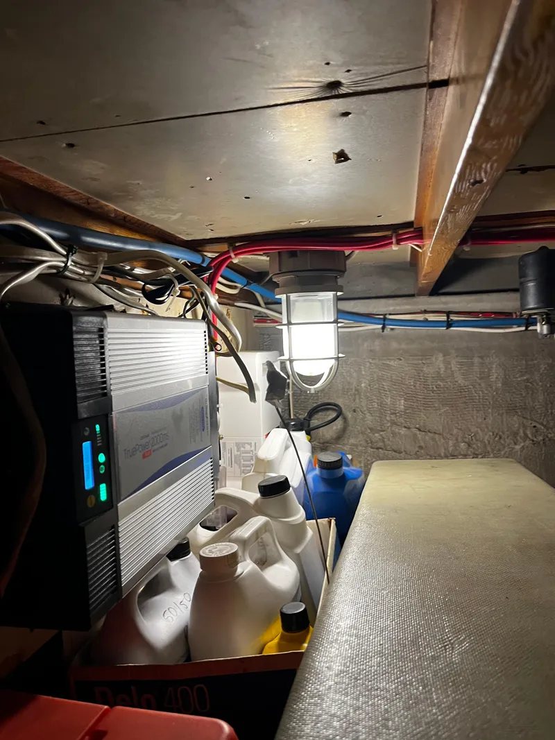 Slide: The Image of Electrical and storage area in 1965 Hatteras 41 Twin Cabin boat. - 44