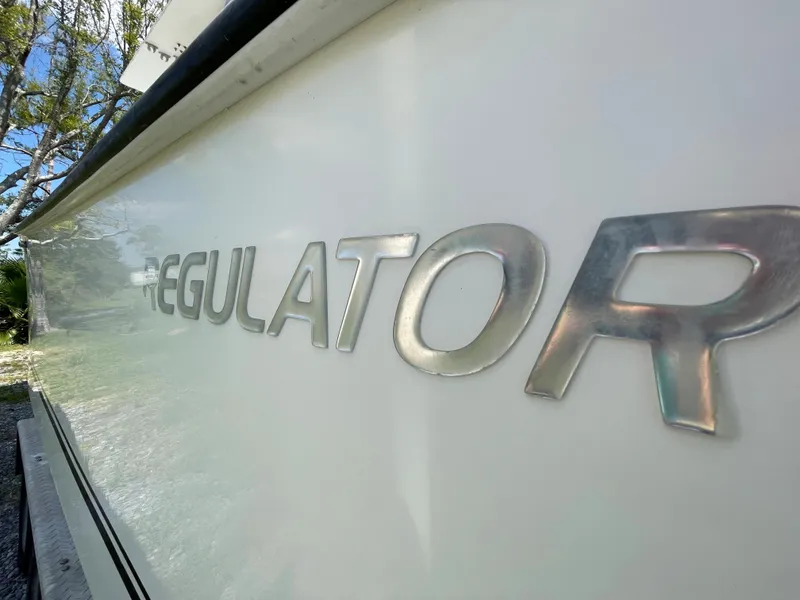 Slide: The Image of Close-up of 1998 Regulator 26 Classic boat nameplate. - 26