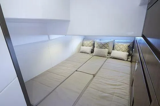 Slide: The Image of Luxurious cabin interior of 2026 Schaefer 400 yacht with cozy bedding and cushions. - 14