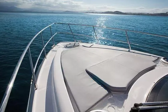 Slide: The Image of Schaefer 400 yacht deck, 2026 model, cruising on calm blue waters. - 19