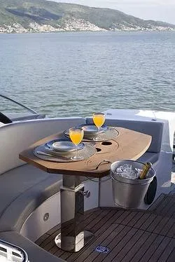 Slide: The Image of Luxury Schaefer 400 yacht deck with drinks, ocean view, 2026 model. - 20