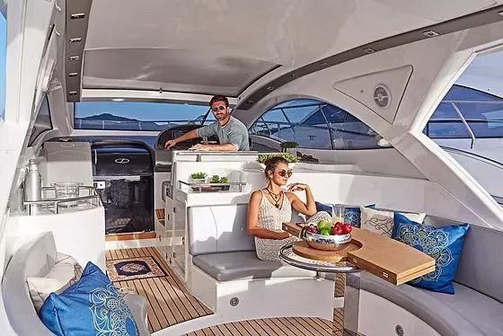 Slide: The Image of Luxurious 2026 Schaefer 400 yacht interior with stylish seating and elegant decor. - 8