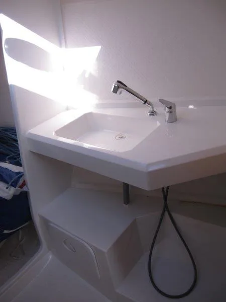 Slide: The Image of 2018 Jeanneau Sun Fast 3600 yacht bathroom sink with modern faucet and storage. - 23