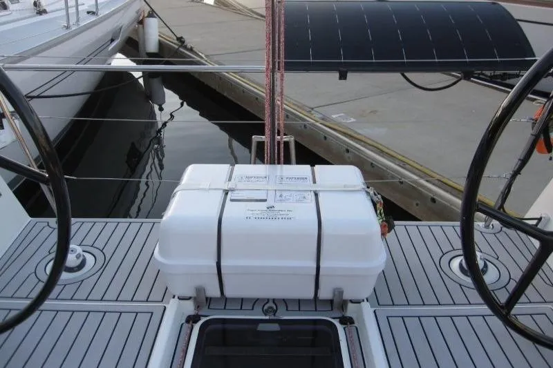 Slide: The Image of 2018 Jeanneau Sun Fast 3600 sailboat deck with dual steering wheels and safety equipment. - 44