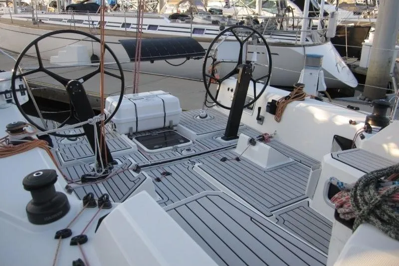 Slide: The Image of 2018 Jeanneau Sun Fast 3600 sailboat cockpit with dual steering wheels at marina. - 52