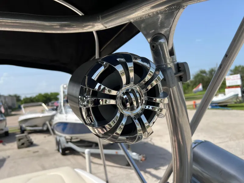 Slide: The Image of Close-up of a chrome speaker on a 2007 Chaparral 210 SSi boat. - 13