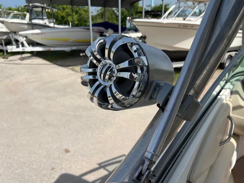 Slide: The Image of Chrome speaker on 2007 Chaparral 210 SSi boat, with other boats in the background. - 14