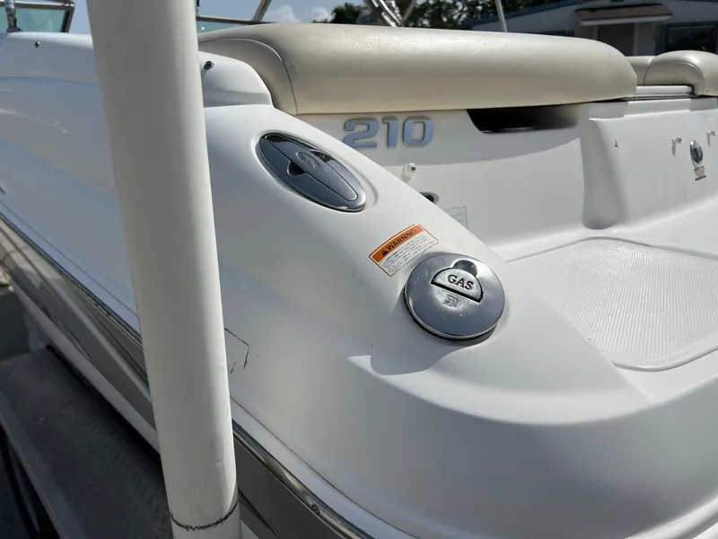 Slide: The Image of 2007 Chaparral 210 SSi boat showing gas cap and seating area. - 20