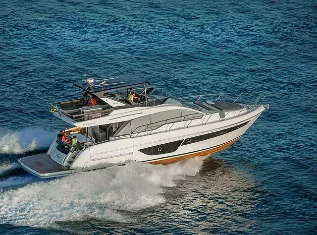 The Image of 2026 Schaefer 600 yacht cruising on open sea, showcasing sleek design and luxury features. - 0