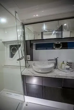 Slide: The Image of Luxurious bathroom in 2026 Schaefer 600 yacht with modern fixtures and elegant design. - 18