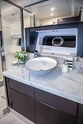 Slide: The Image of Luxurious Schaefer 600 yacht bathroom with marble countertop and modern fixtures, 2026 model. - 20