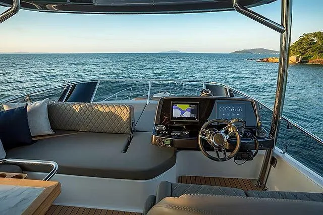 Slide: The Image of Luxurious Schaefer 600 yacht interior, 2026 model, with ocean view and modern navigation system. - 23