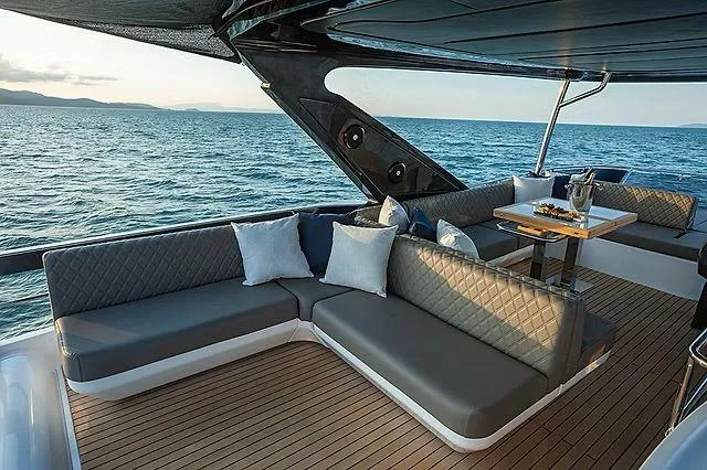 Slide: The Image of Luxurious Schaefer 600 yacht deck with elegant seating, ocean view, and modern design, 2026 model. - 24