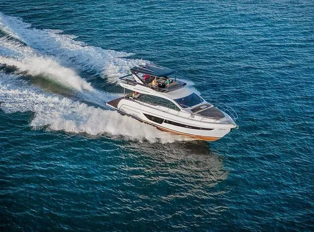 Slide: The Image of Schaefer 600 yacht cruising on open water, 2026 model. - 3