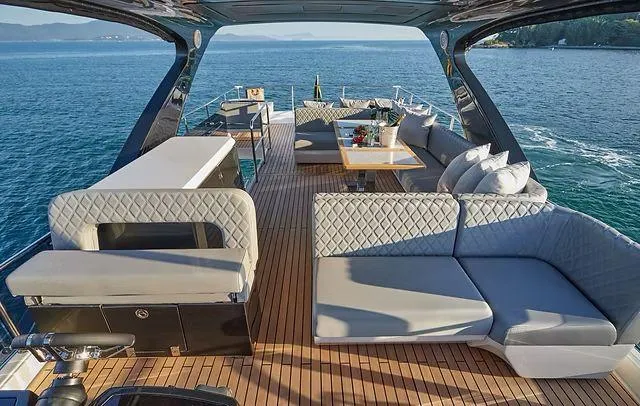 Slide: The Image of Luxurious Schaefer 660 yacht interior with elegant seating and ocean view, 2025 model. - 32