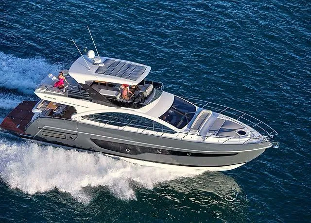 Slide: The Image of Schaefer 660 yacht cruising on open water, 2025 model. - 4