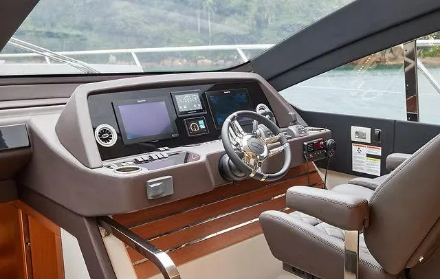 Slide: The Image of Modern Schaefer 660 yacht helm with advanced navigation systems, 2025 model. - 16
