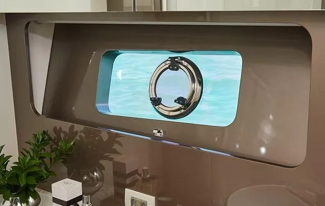 Slide: The Image of Porthole view from Schaefer 660 yacht, 2025 model, with ocean scenery. - 27
