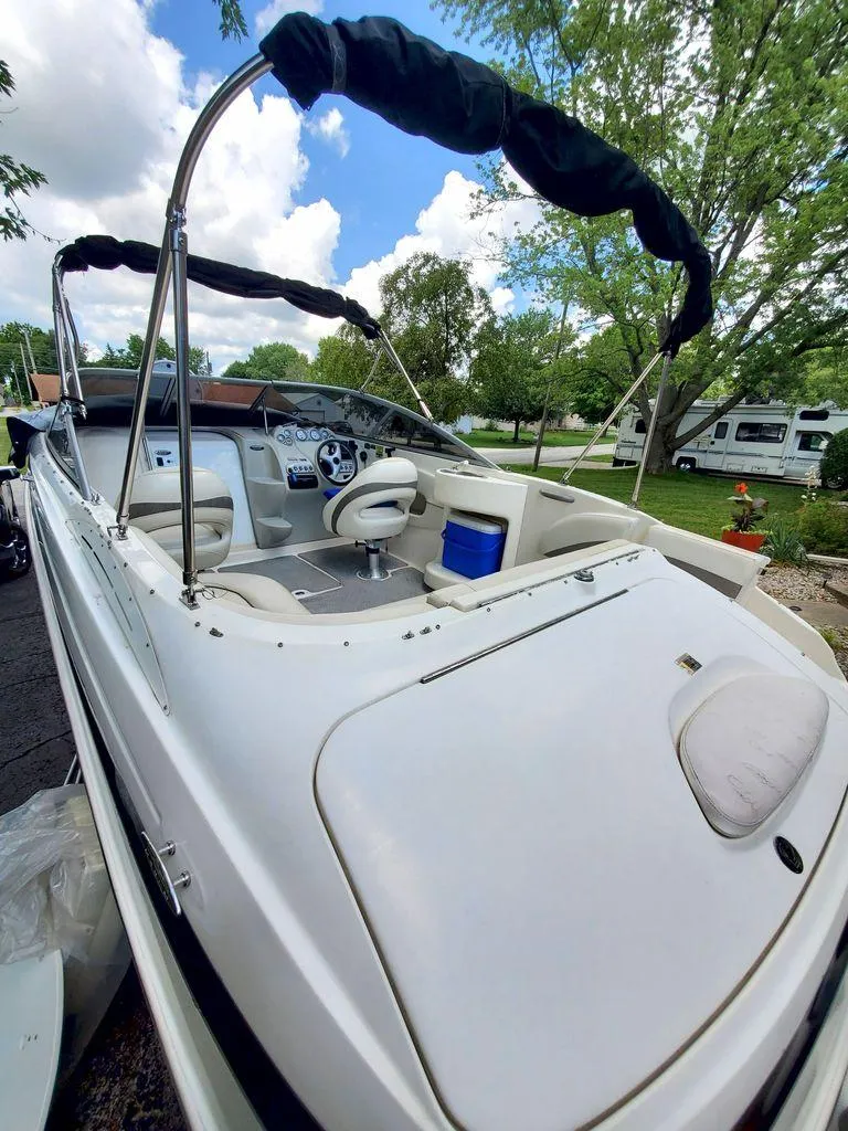 Slide: The Image of Interior of a 2006 Maxum SC3 boat with steering console. - 3