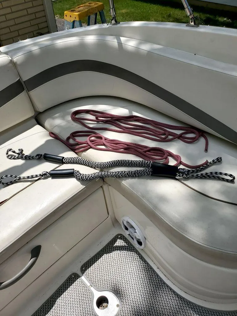Slide: The Image of Coffee pot on Maxum SC3 boat table, serene lake in background. - 4