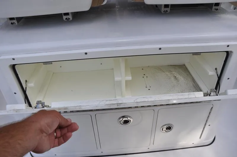 Slide: The Image of Open storage compartment on a 2019 Sportsman Masters 267 Bay Boat. - 17