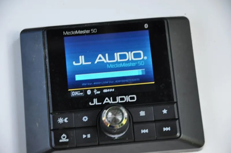 Slide: The Image of JL Audio MediaMaster 50 display on 2019 Sportsman Masters 267 Bay Boat. - 28