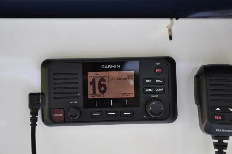 Slide: The Image of Garmin marine radio on 2019 Sportsman Masters 267 Bay Boat dashboard. - 29