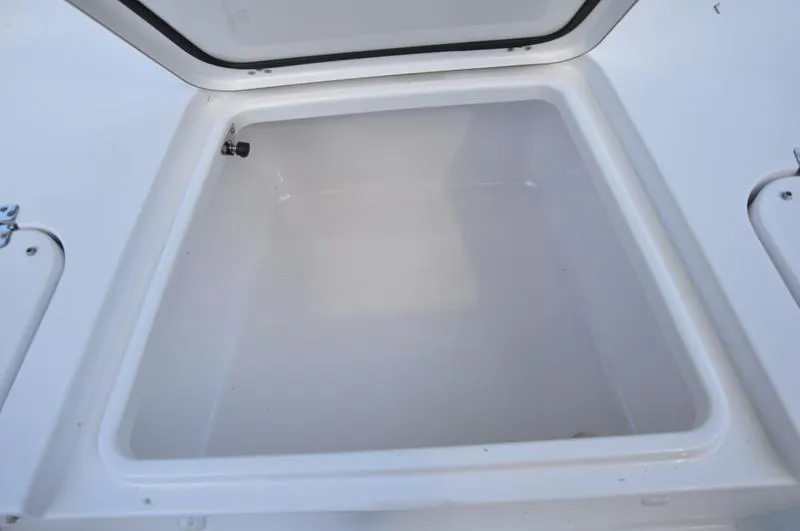 Slide: The Image of Open storage compartment on 2019 Sportsman Masters 267 Bay Boat. - 35