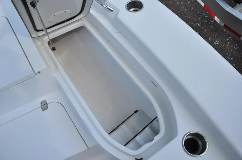 Slide: The Image of Open storage compartment on a 2019 Sportsman Masters 267 Bay Boat. - 36
