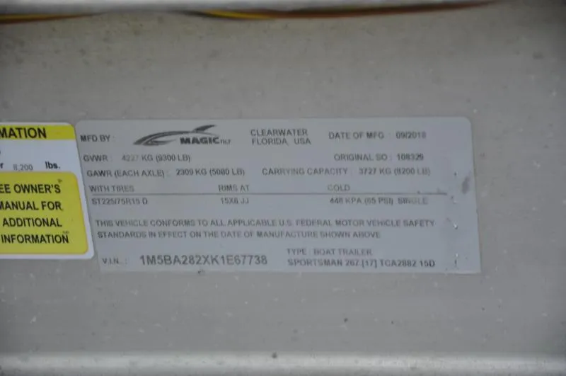 Slide: The Image of Label on a 2019 Sportsman Masters 267 Bay Boat trailer with specifications and safety information. - 41