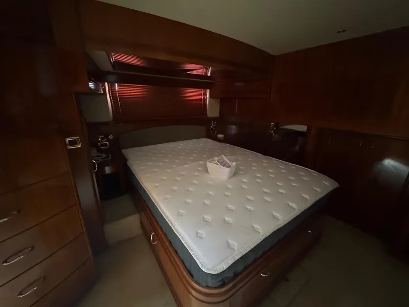 Slide: The Image of Luxurious bedroom interior of 2003 Carver 570 Voyager Pilothouse yacht. - 14