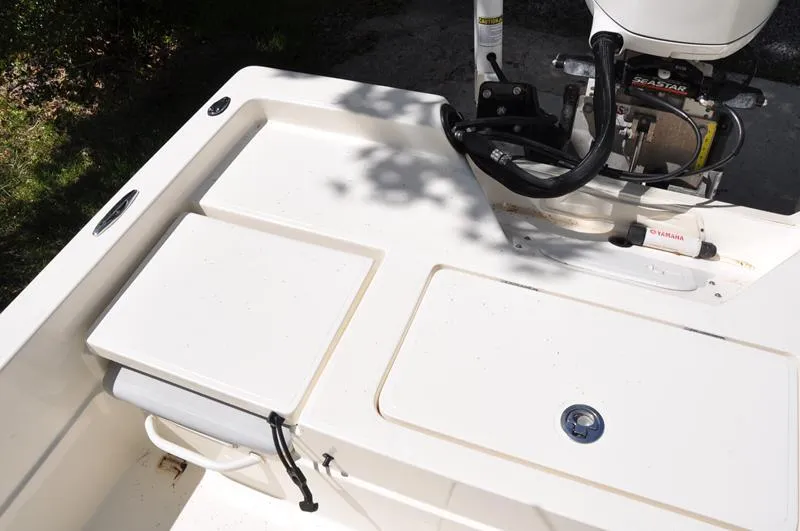 Slide: The Image of 2017 Skeeter SX 210 boat deck with Yamaha engine and storage compartments. - 12