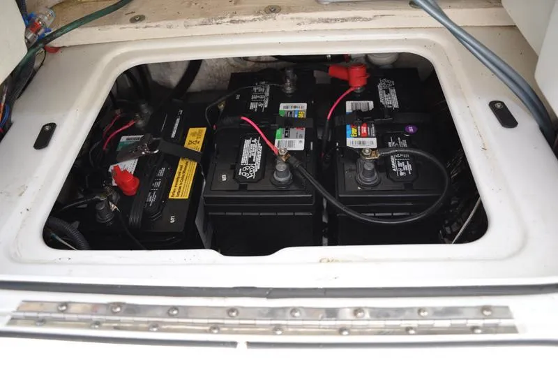Slide: The Image of Batteries in a 2017 Skeeter SX 210 boat compartment. - 21