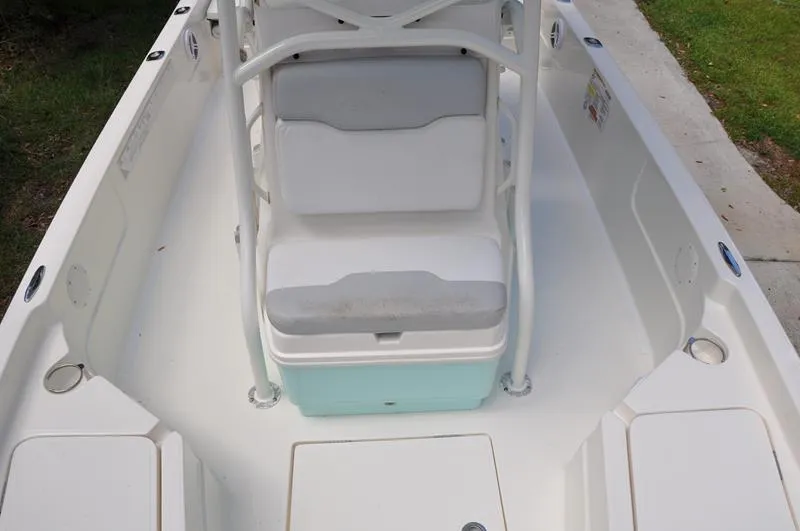 Slide: The Image of 2017 Skeeter SX 210 boat interior with seating and storage compartments. - 34