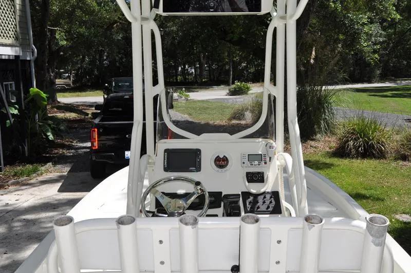 Slide: The Image of 2017 Skeeter SX 210 boat console with steering wheel and navigation equipment. - 9
