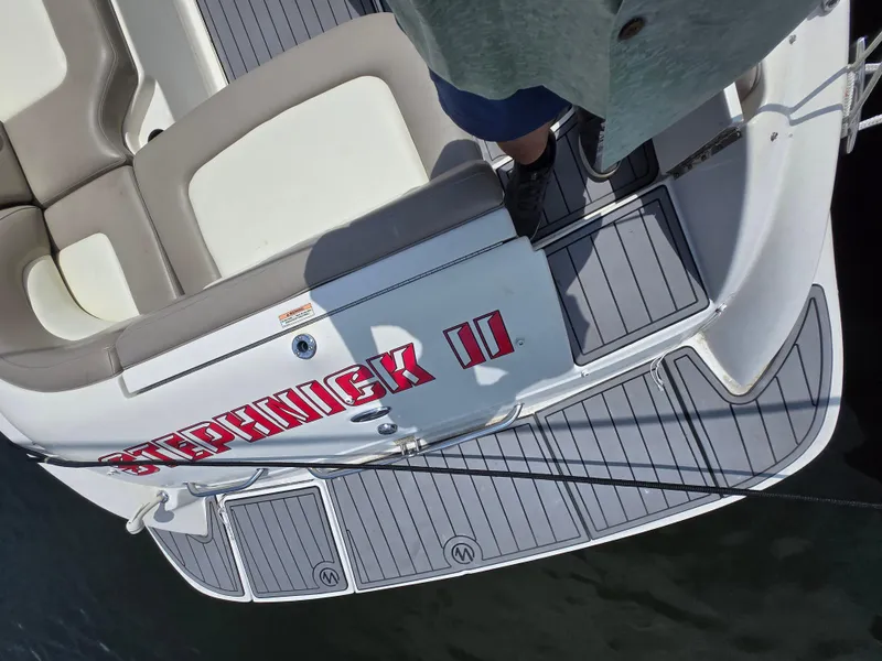 Slide: The Image of 2006 Sea Ray 270 Sundeck boat with custom name "Stephnick II" on deck. - 19