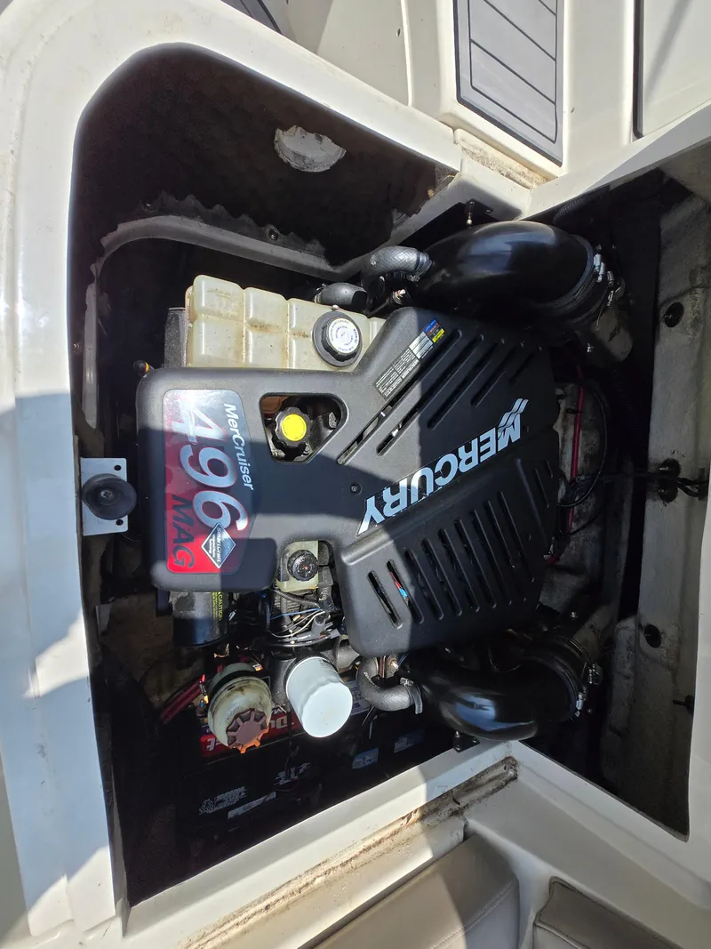 Slide: The Image of Engine compartment of a 2006 Sea Ray 270 Sundeck with a Mercury 496 MAG engine. - 4