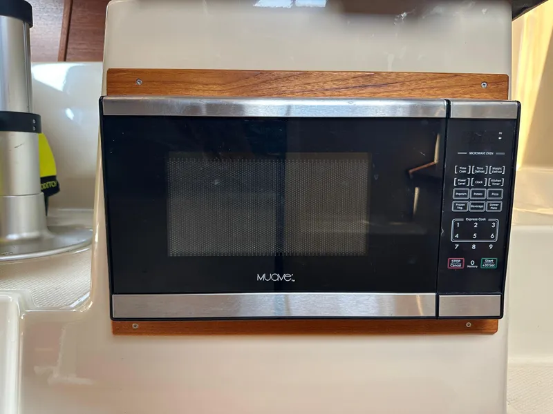 Slide: The Image of Microwave oven inside 2019 Ranger Tugs R-23 boat kitchen area. - 10