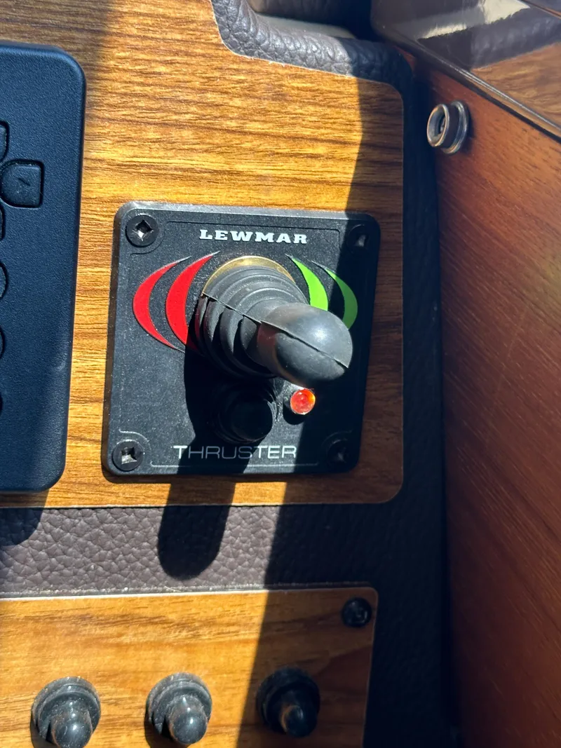 Slide: The Image of Lewmar thruster control on 2019 Ranger Tugs R-23 boat dashboard. - 5