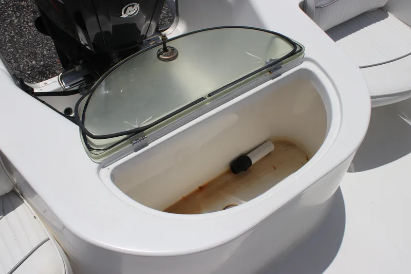 Slide: The Image of Open storage compartment on 2008 Sea Pro 186 Center Console boat. - 11