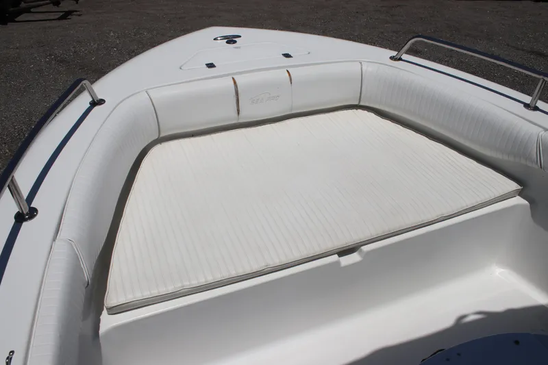 Slide: The Image of 2008 Sea Pro 186 Center Console boat with cushioned seating area. - 7
