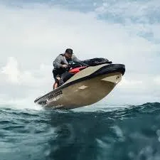 Slide: The Image of 2025 Sea-Doo RXT-X 325 jet ski jumping over ocean waves. - 5