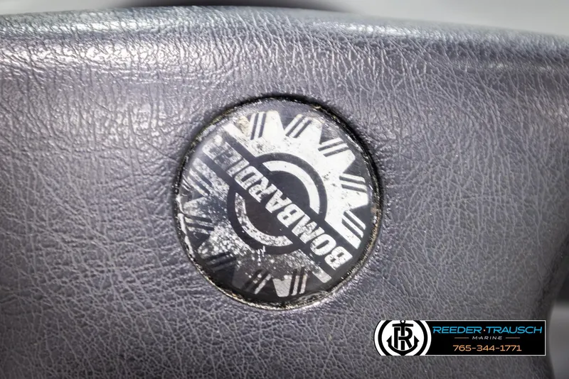Slide: The Image of Close-up of a 1997 Celebrity 190 steering wheel with Bomar logo. - 23