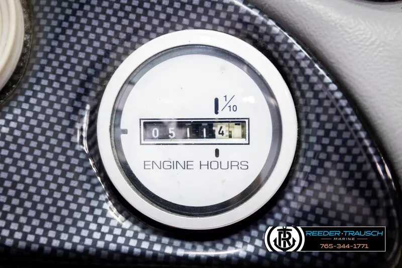 Slide: The Image of Close-up of a 1997 Celebrity 190 engine hour meter reading 514 hours. - 29