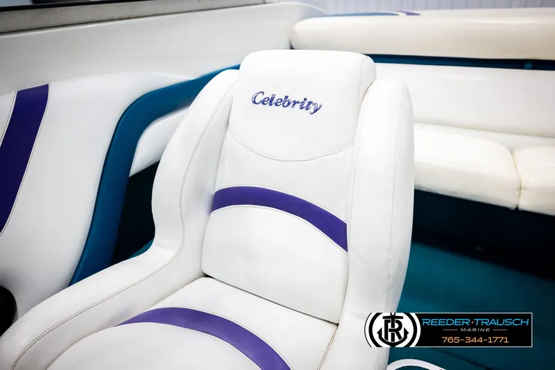 Slide: The Image of White and purple boat seat with "Celebrity" logo, model 190, 1997. - 36